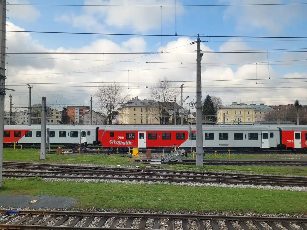 CityShuttle train with a bicycle logo next to a door