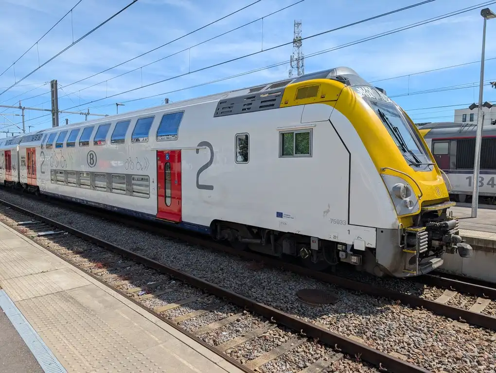 Double-deck intercity train on a platform
