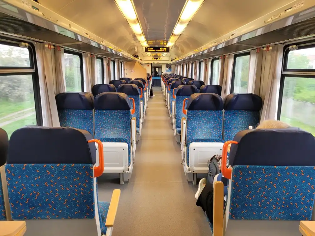 Open-plan second class seats in an intercity train