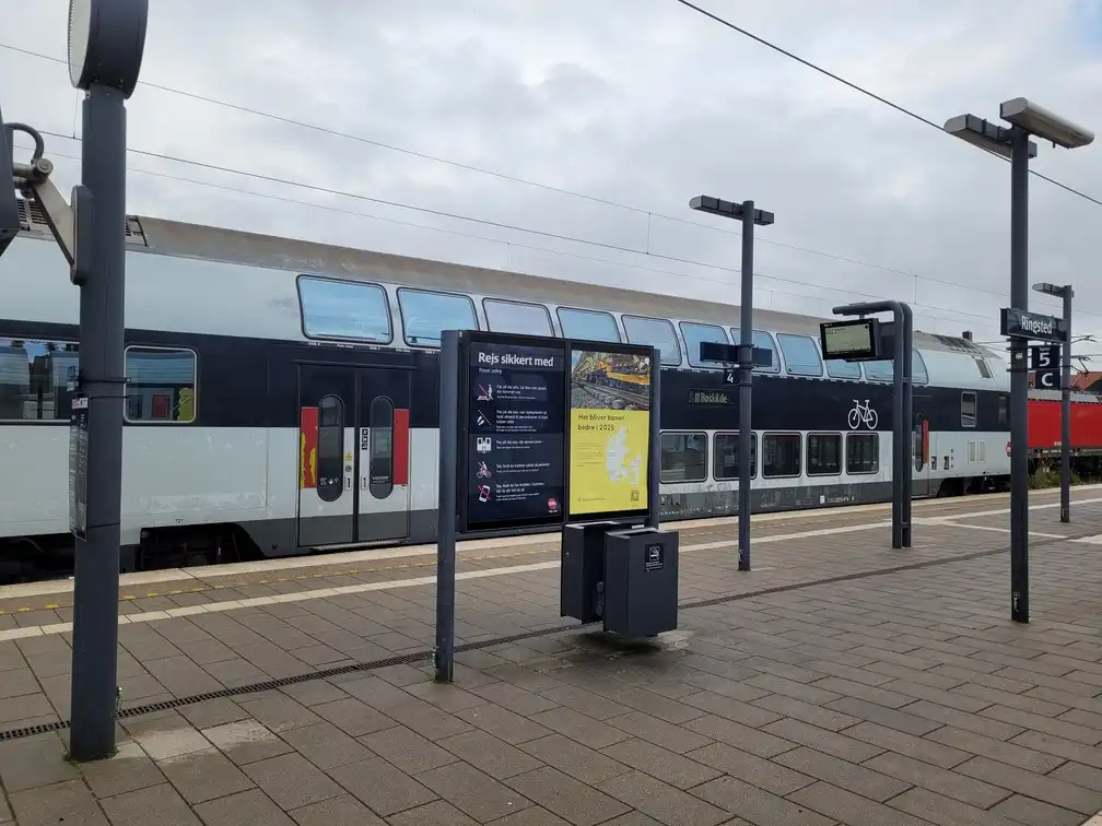 Double-decker regional train on a platform