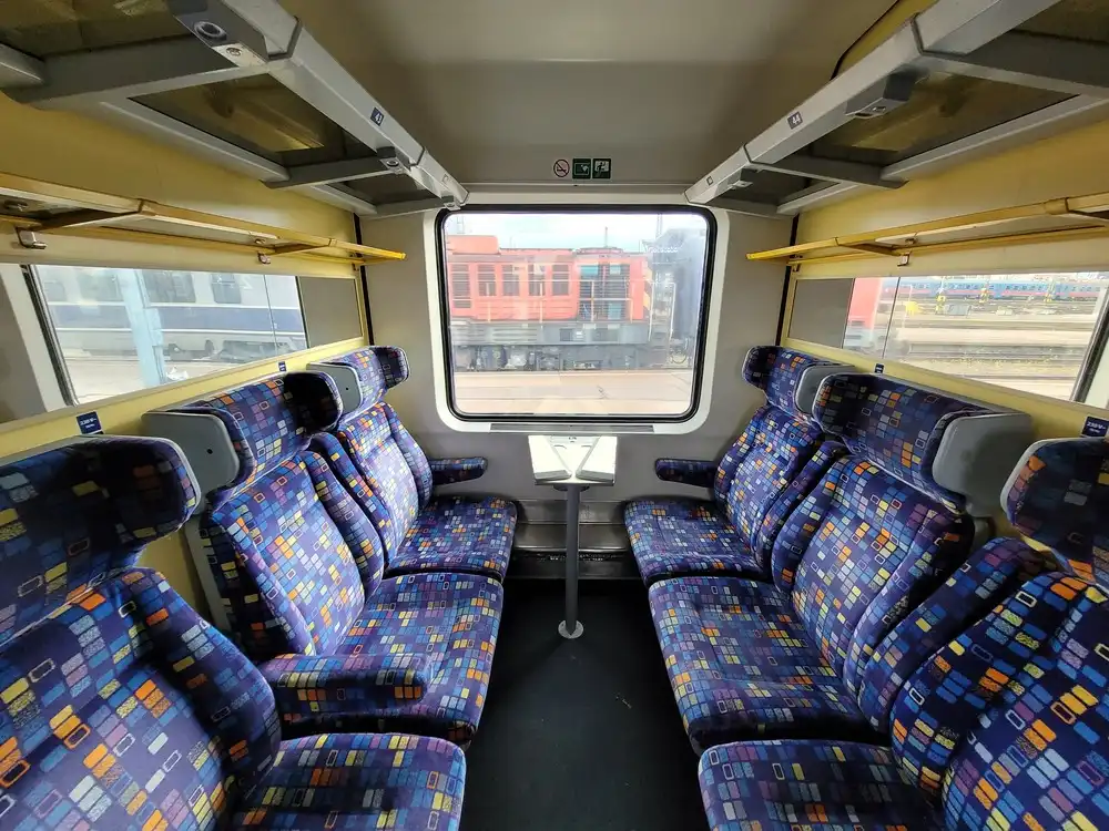 Seating compartment in a modern train