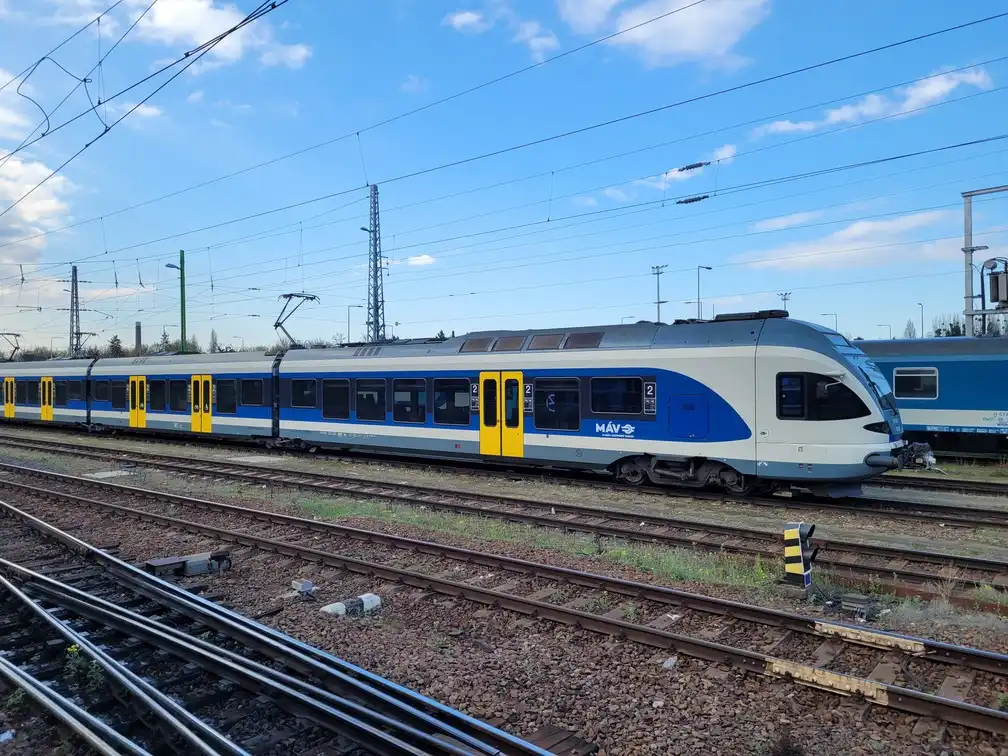 Modern regional train on railway tracks