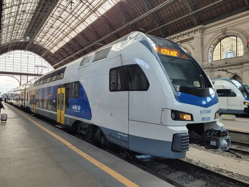 Modern double-decker regional train on a platform