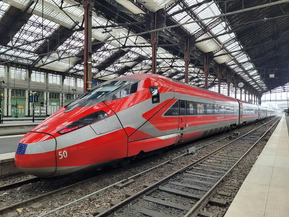 Frecciarossa 1000 train on a platform
