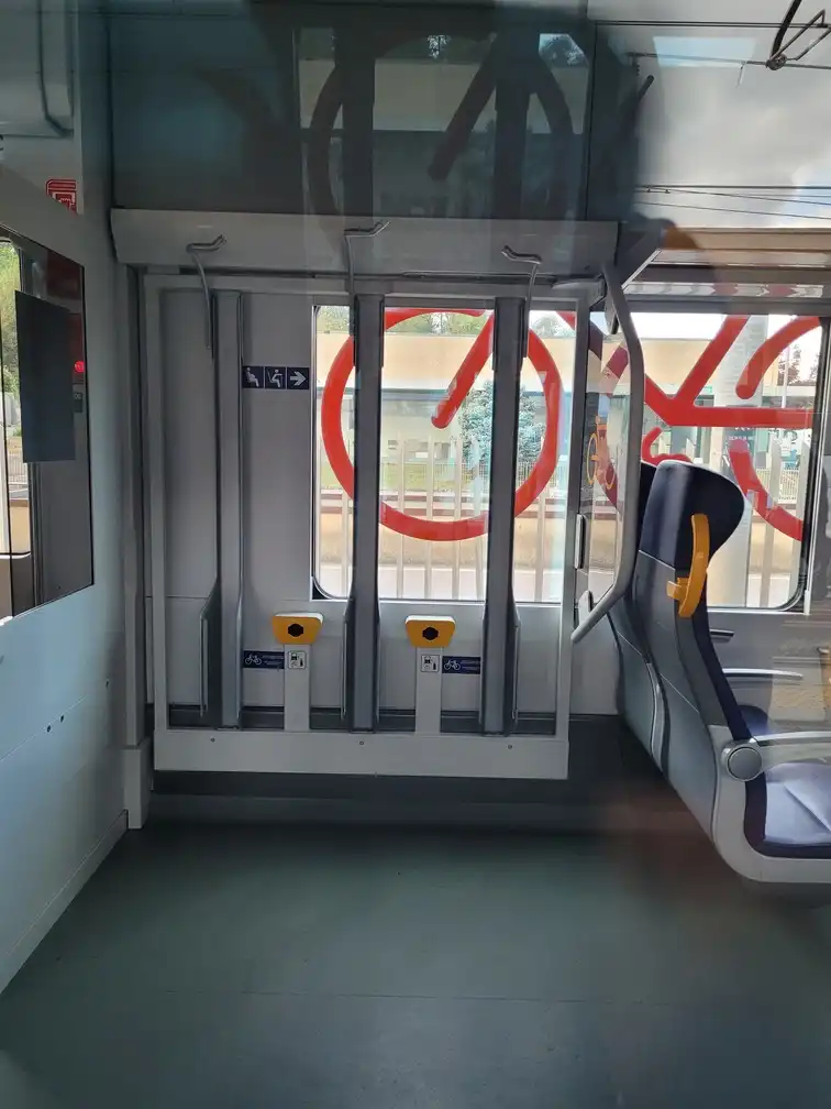 Bicycle space with power plugs in an ETR 104 regional train