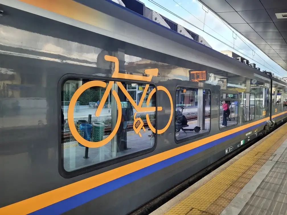 Ebike logo on an ETR 104 regional train on a platform