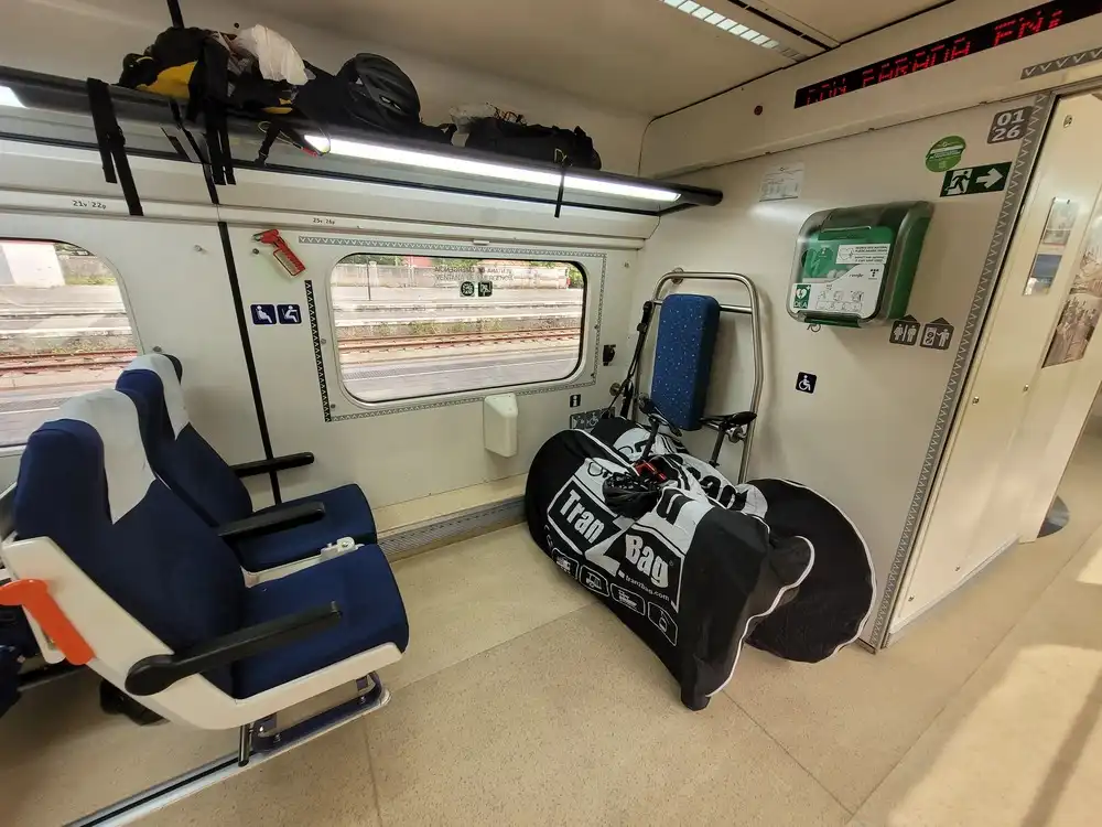 Packed bicycles in the mixed-use space in a Renfe series 594