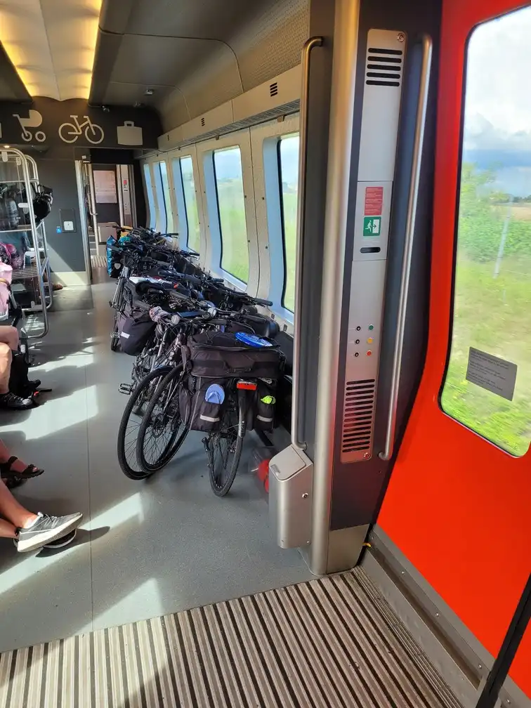 Bicycles stacked on one side in an Øresundståg train