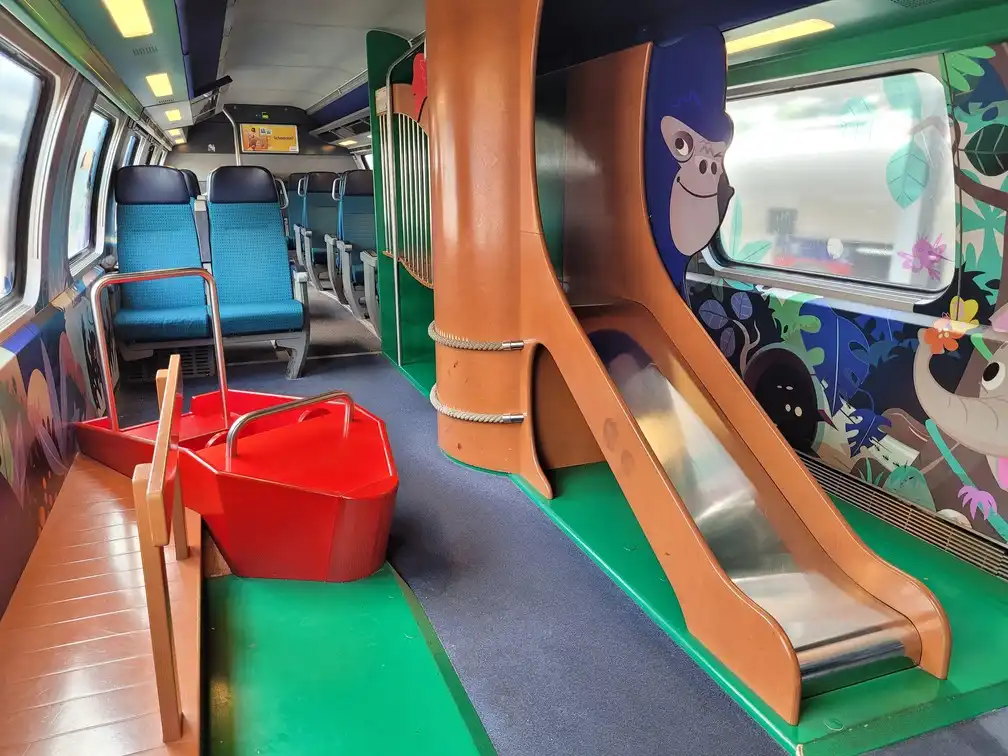 Playground slide in the upper part of a train