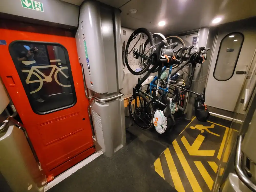 Three bicycles stored vertically