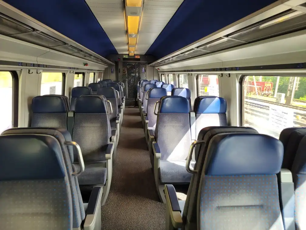 Rows of seats inside the tilting train