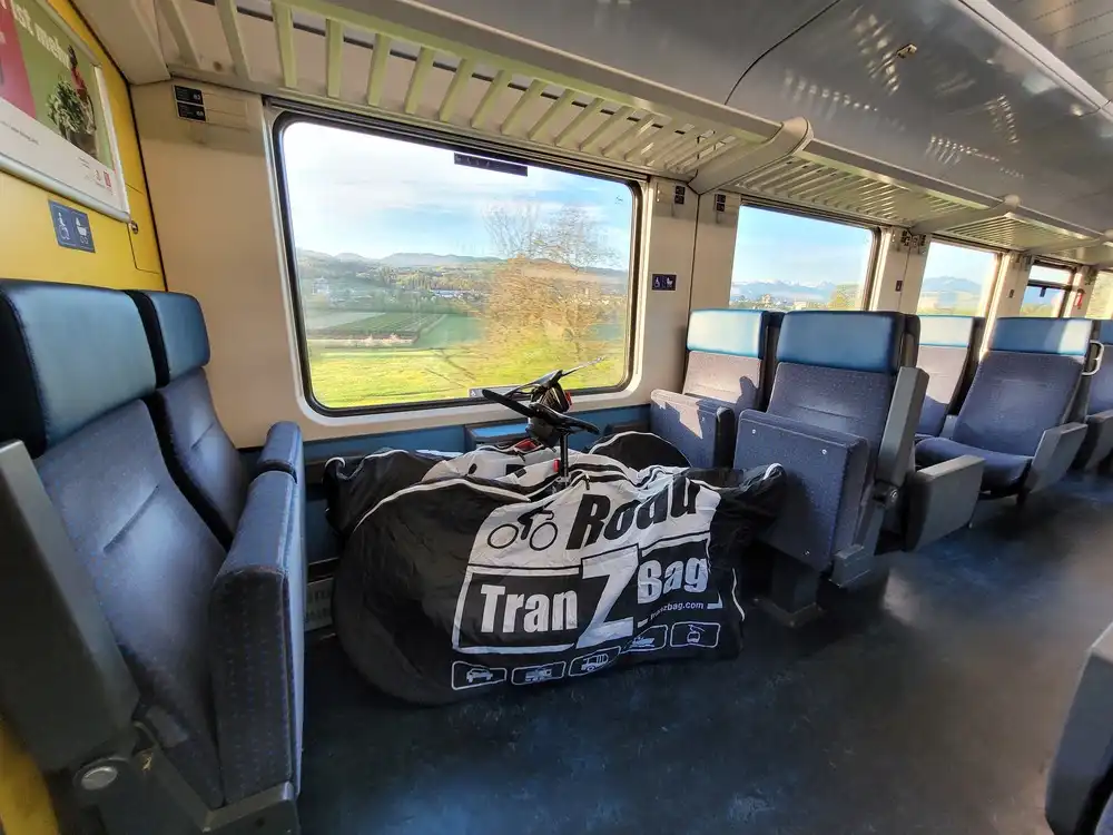 Square of folded seats with packed bicycles in between