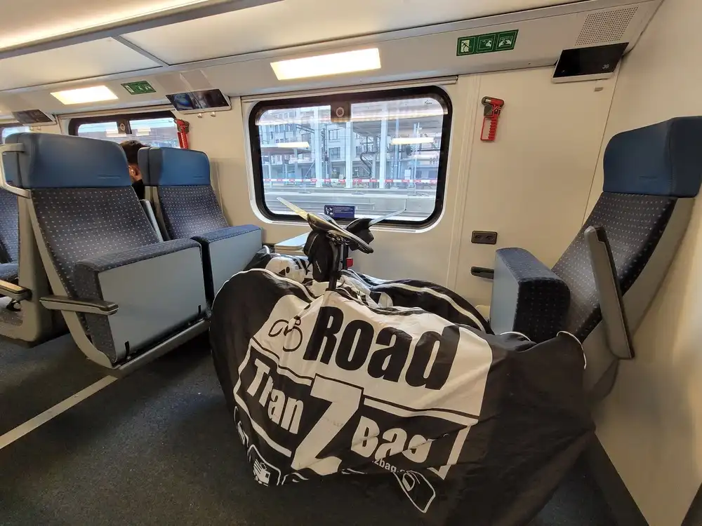 Three folded seats with packed bicycles in between